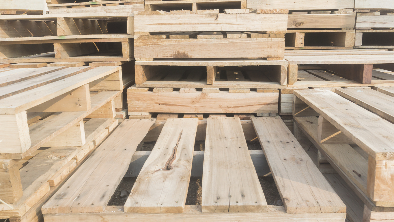 empty wood pallets representing a raw materials shortage